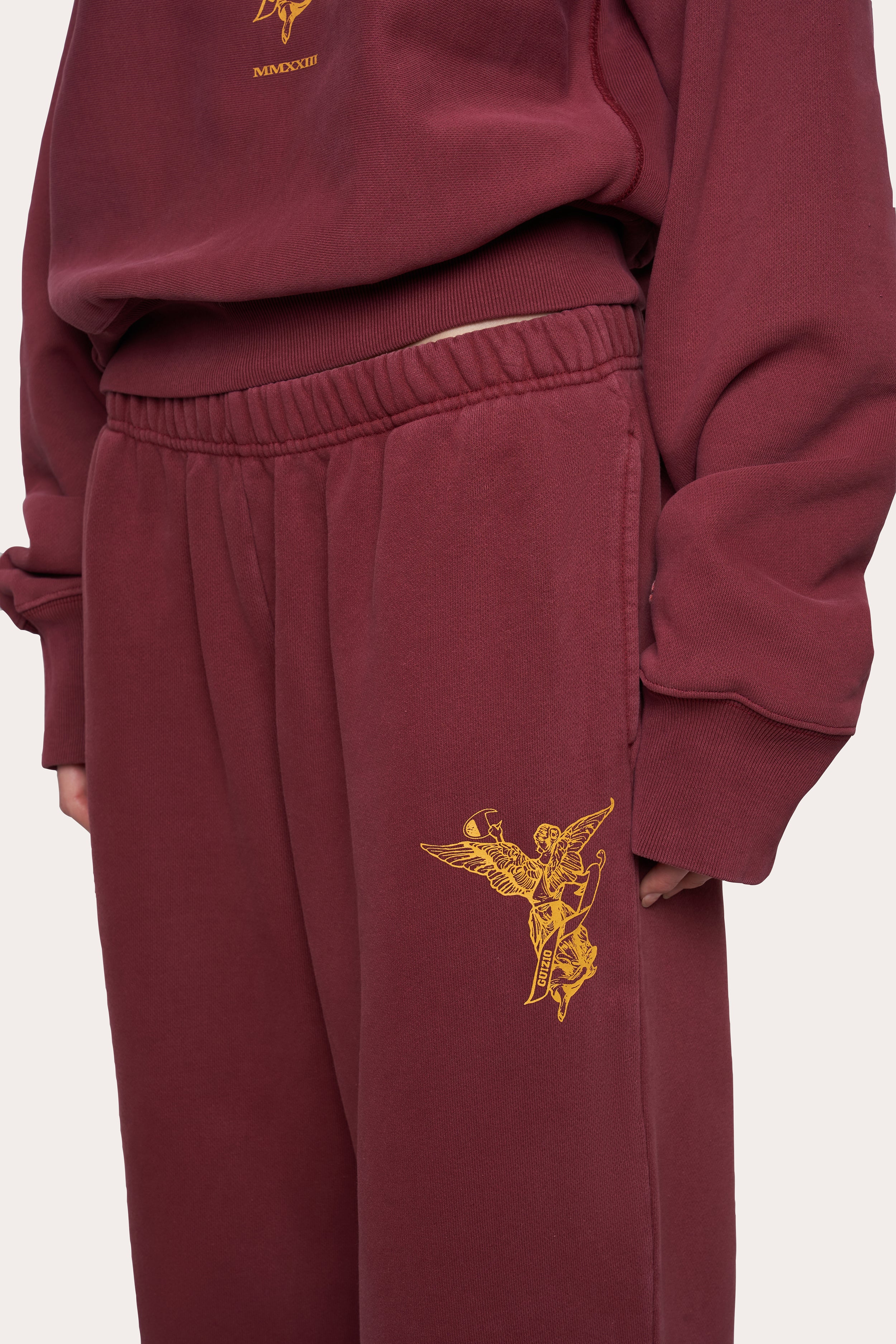 Guizio X Champion Reverse Weave Flare Sweatpants in Sun Dye Sepia Red